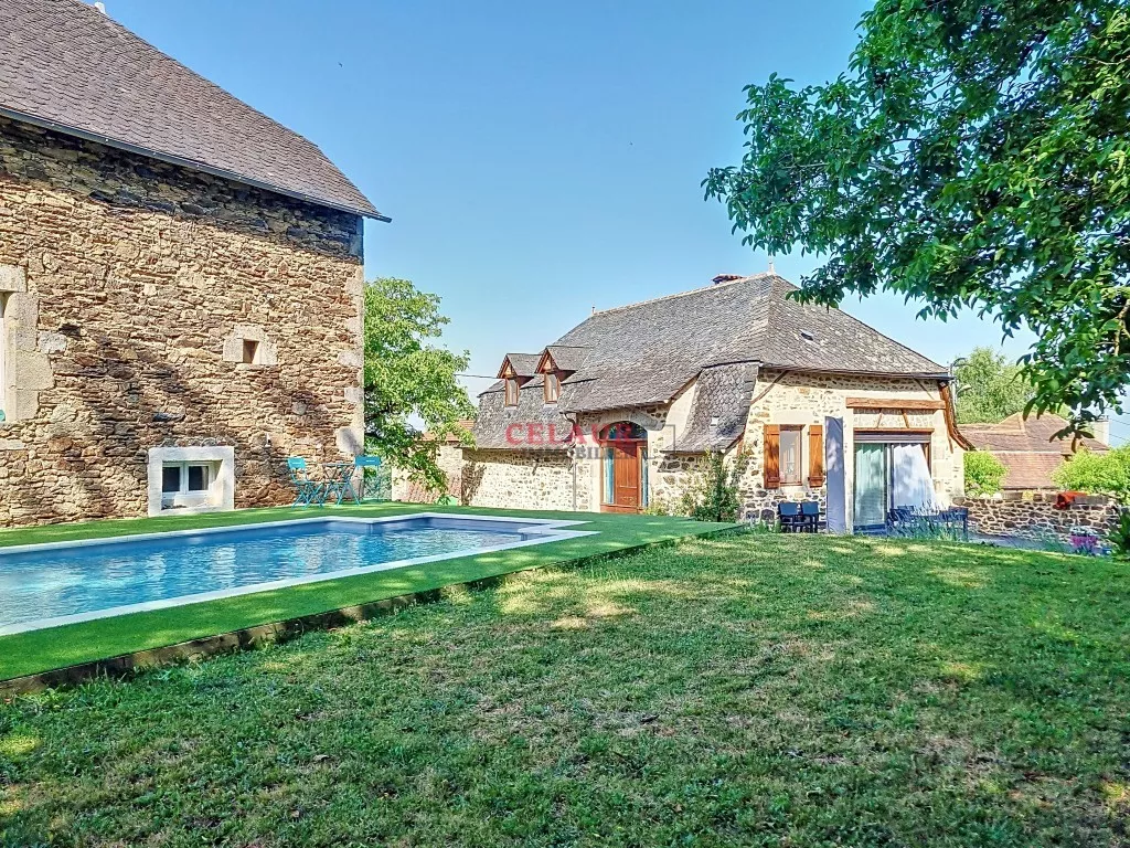 Stone building complex with swimming pool
