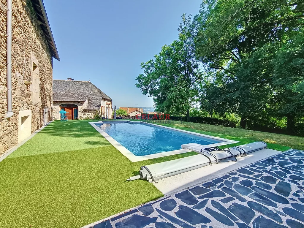 Stone building complex with swimming pool