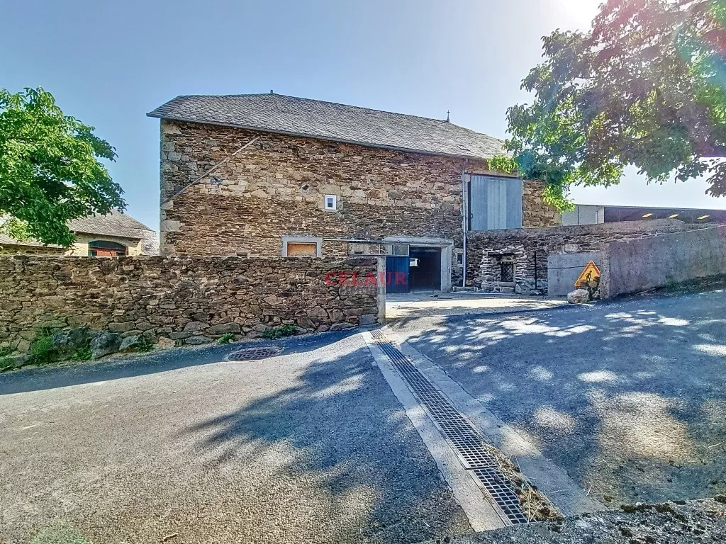 Stone building complex with swimming pool
