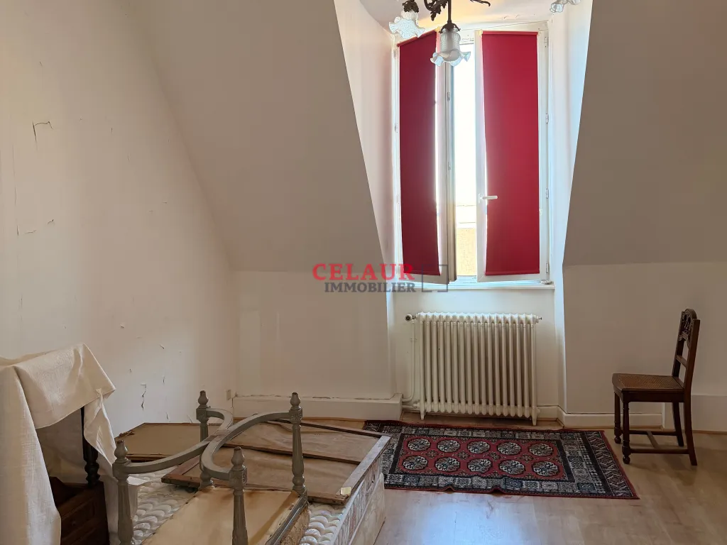 Maison bourgeoise en plein centre